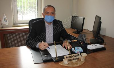 Koronavirüsü yenen Nüfus Müdürü Mustafa Yangın, görevine başladı.