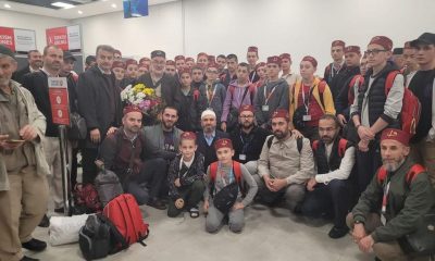 KUTSAL TOPRAKLARDAN DÖNEN HAFIZ UMRECİLER ÇİÇEKLERLE KARŞILANDI